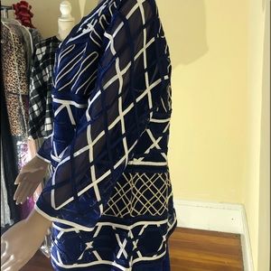 Beautiful caftan, and light jacket , with white strips and tree quatre sleeves